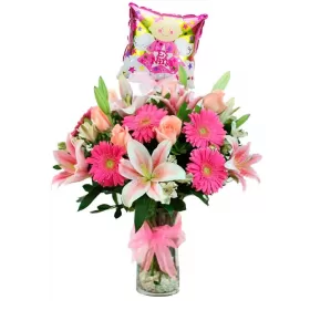 NACIMIENTO FLORERO ROSAS LILIUMS Y GERBERAS ROSADAS MÁS GLOBO ES NIÑA